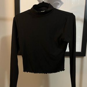 Garage cropped black mock neck top
